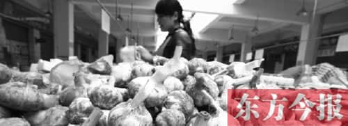 中牟大蒜丰收蒜农难高兴 蒜你狠变成蒜你贱